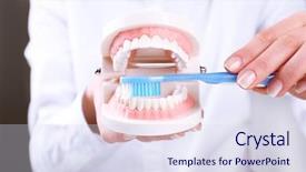  Presentation with dental - Colorful PPT layouts enhanced with female hand holding dental model backdrop and a sky blue colored foreground