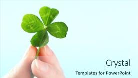  Presentation with clover - PPT theme with female hand holding green clover leaf on sky background background and a cool aqua colored foreground