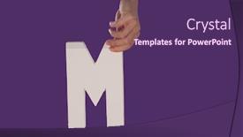  Presentation with literature - Colorful presentation theme enhanced with female hand holding up the uppercase capital letter m isolated against a purple background conceptual of the alphabet writing literature and typeface backdrop and a violet colored foreground