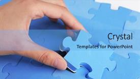  Presentation with last - Slide set featuring female hand placing last piece background and a light blue colored foreground