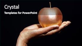  Presentation with gold black - Theme with female hand with gold bodypainting holding an apple on a black background background and a black colored foreground