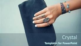  Presentation with jewelry - Amazing PPT theme having female hand with jewelry and clutch bag on color background backdrop and a ocean colored foreground