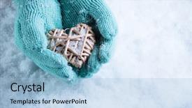  Presentation with teal - Presentation consisting of female hands in light teal knitted mittens with entwined beige flaxen heart on a white snow background love and st valentines day concept background and a light blue colored foreground