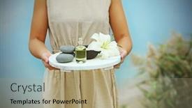  Presentation with spa - Beautiful PPT theme featuring female hands with tray of spa products outdoors backdrop and a coral colored foreground