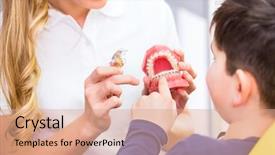  Presentation with dental - PPT layouts consisting of female orthodontist explaining boy braces background and a coral colored foreground