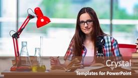 Presentation with chemistry - Audience pleasing PPT theme consisting of female student preparing for chemistry exams backdrop and a tawny brown colored foreground