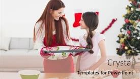  Presentation with christmas baking - Theme enhanced with festive mother and daughter baking together at home at christmas background and a soft green colored foreground