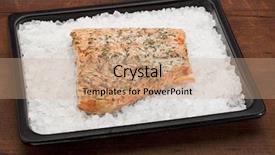  Presentation with thyme - Slides consisting of fillet of norwegian salmon seasoned with lemon juice and thyme freshly baked on rock salt background and a coral colored foreground