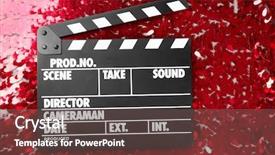  Presentation with red movie - Amazing PPT theme having film award ceremony - movie clapper on red bright backdrop and a dark gray colored foreground