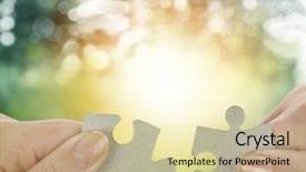  Presentation with holding puzzle pieces - Amazing slides having fingers holding two puzzle pieces backdrop and a soft green colored foreground