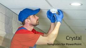  Presentation with fire alarm - PPT theme enhanced with fire alarm - worker installing smoke detector background and a coral colored foreground