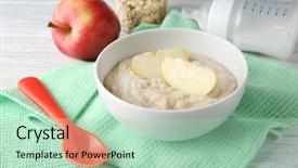 Presentation with baby growth and development - Beautiful PPT theme featuring first fruits - bowl with porridge for baby backdrop and a mint green colored foreground