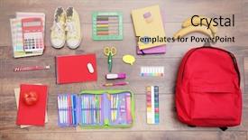  Presentation with backpack - Beautiful PPT theme featuring first fruits - school set with backpack shoes backdrop and a soft green colored foreground