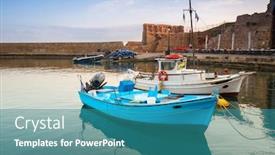  Presentation with fishing boats - PPT theme having fishing boats in the harbor of chania on crete greece background and a teal colored foreground
