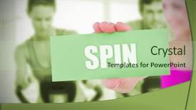  Presentation with exercise bike - PPT layouts consisting of fit blonde holding card saying spin against exercise bike class in gym background and a mint green colored foreground