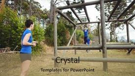  Presentation with bare breasted woman - Beautiful PPT theme featuring fit woman climbing monkey bars backdrop and a  colored foreground