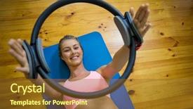  Presentation with pilates - Amazing PPT theme having fit woman exercising with pilates backdrop and a tawny brown colored foreground
