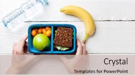  Presentation with lunch box - PPT theme consisting of school food fitness - photo of man's hands background and a soft green colored foreground