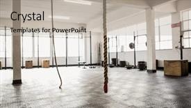  Presentation with gym - Amazing slide deck having fitness room - exercise ropes hanging and equipment backdrop and a mint green colored foreground