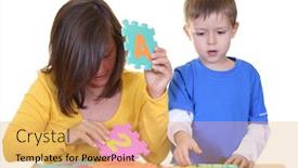  Presentation with white letters - Audience pleasing slide deck consisting of five years boy and his mother - playing with letters - isolated on white backdrop and a yellow colored foreground
