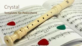  Presentation with recorder - Cool new presentation design with flute recorder lying on notes sheet with several guitar pick-ups backdrop and a lemonade colored foreground