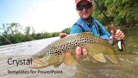  Presentation with holding bucket while water droplet - PPT theme enhanced with fly-fisherman holding brown trout background and a coral colored foreground