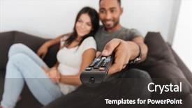  Presentation with young happy couple - Presentation theme featuring focus on hand with remote background and a dark gray colored foreground