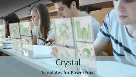  Presentation with lecture hall - Presentation theme consisting of focused students working on their background and a light blue colored foreground