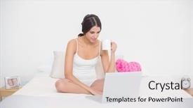  Presentation with bright white - Slide set enhanced with focused young brown haired model in white pajamas using a laptop while drinking coffee in bright bedroom background and a lemonade colored foreground