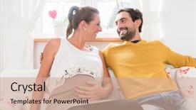  Presentation with living room - Audience pleasing slide set consisting of foetus - parents-to-be in their living room backdrop and a coral colored foreground