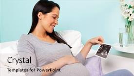  Presentation with baby ultrasound - Beautiful PPT theme featuring foetus - photo of a pregnant woman backdrop and a soft green colored foreground
