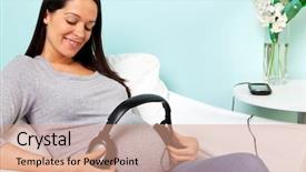  Presentation with baby sitting - PPT layouts featuring foetus - pregnant woman at home sitting background and a coral colored foreground