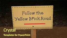  Presentation with yellow brick road - Slide deck featuring follow the yellow brick road background and a tawny brown colored foreground
