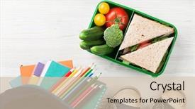  Presentation with lunch box - Presentation design having food box and school supplies background and a soft green colored foreground