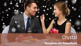  Presentation with christmas food - Theme having food christmas holidays and people concept - smiling couple eating dessert at restaurant over black snowy background background and a tawny brown colored foreground