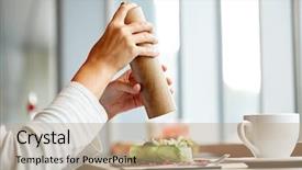  Presentation with salt food - Amazing theme having food culinary eating and people concept - woman hand with salt shaker seasoning brie cheese salad at restaurant or cafe backdrop and a coral colored foreground