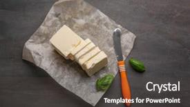  Presentation with butter - Slide deck having food paper with sliced butter knife and leaves of basil on dark table background and a dark gray colored foreground