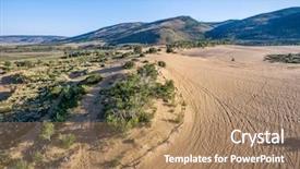 Presentation with footprints sand - PPT theme featuring footprints and vehicle tracks on sand at north sand hills only place in colorado to legally ride on sand dunes - aerial view background and a coral colored foreground
