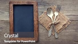  Presentation with rustic blackboard - Presentation theme having fork and spoon on a rustic table with a rough frame for chalk records blackboard next to the dining utensils top view background and a gray colored foreground