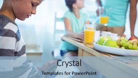  Presentation with reading table - PPT theme featuring free children reading - boy using digital tablet background and a light blue colored foreground