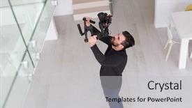  Presentation with videographer - Slides featuring shakes free - young videographer with gimball video background and a light gray colored foreground