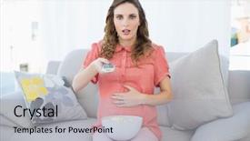  Presentation with television watching - Presentation having free pregnancy - astonished pregnant woman sitting background and a light gray colored foreground