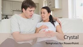  Presentation with feeling useless - Presentation enhanced with free pregnancy - expectant couple sitting on couch background and a soft green colored foreground