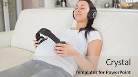  Presentation with pregnant woman - Presentation theme enhanced with free pregnancy - pregnant woman holding headphones background and a soft green colored foreground