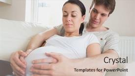  Presentation with catholic couple silhouette of young - PPT theme with free pregnancy - young couple lying background and a soft green colored foreground