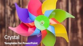  Presentation with pinwheel - Beautiful theme featuring free wind turbine - colorful pinwheel on wooden background backdrop and a tawny brown colored foreground