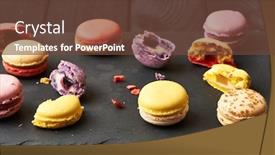  Presentation with dessert - Amazing PPT layouts having french delicious dessert macaroons on table backdrop and a tawny brown colored foreground