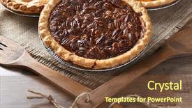  Presentation with utensils - Amazing PPT theme having fresh baked pecan pie backdrop and a tawny brown colored foreground
