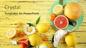  Presentation with citrus - Amazing slide deck having fresh citrus fruits on a yellow wooden table backdrop and a yellow colored foreground
