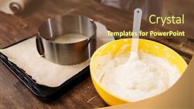  Presentation with parchment paper - Amazing presentation having fresh dough in bowl and pan with parchment paper backdrop and a tawny brown colored foreground